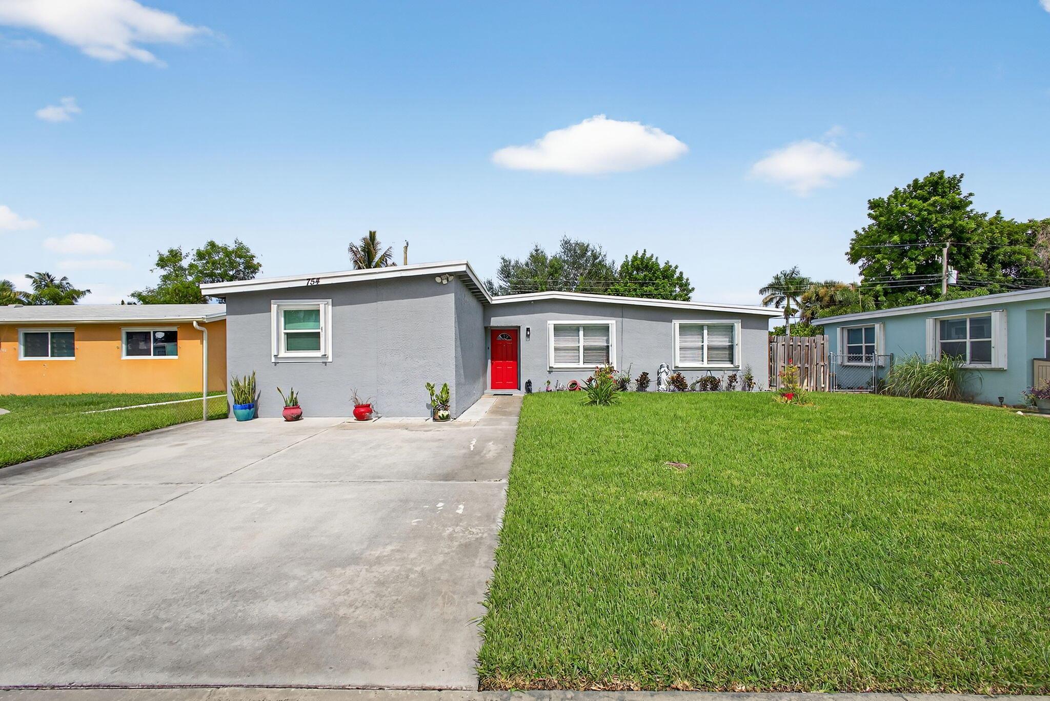 This well-maintained cbs, 3 bdrm/ 2bth home includes a versatile den with a closet--ideal as a potential 4th bedroom. The kitchen has been tastefully updated with granite countertops and crisp white cabinetry, offering a clean and modern feel. Tile flooring runs throughout the main living areas, with laminate in the bedrooms. A spacious 18.5' x 9'10'' storage room with a separate entrance provides endless possibilities--convert it into an efficiency, studio, or workshop. Located in the heart of Royal Palm Beach, you're just minutes from top-rated schools, shopping, dining, the mall, grocery stores, the airport.