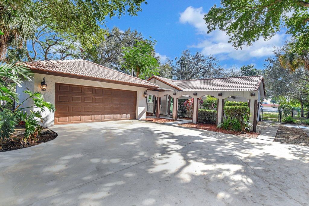 Photo of 1200 NW 8th Street, Boca Raton, FL 33486 (MLS # R11076915)