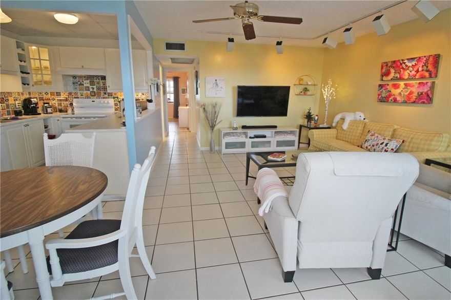 4TH FLOOR LAKE VIEW!! YOU WILL LOVE TO SIT AND ENJOY YOUR COFFEE ON THE ENCLOSED PATIO OF THIS 2 BEDROOM, 1.5 BATH! NOT ONLY DO YOU HAVE A GORGEOUS VIEW, BUT WAIT UNTIL YOU SEE THE UPDATED KITCHEN WITH NEW CABINETS, COLORFUL TILE BACKSPLASH AND EXTRA CABINETS IN THE DINING ROOM!! SO MUCH STORAGE SPACE!! CERAMIC TILE FOORS THRU-OUT! FULLY FURNISHED WITH KING SIZE BED IN THE PRIMARY BEDROOM AND SOFA BED IN THE GUEST ROOM! PRIMARY BATHROOM FEATURES A NEW VANITY & TOILET, PLUS GLASS SHOWER DOORS! GUEST BATH HAS NEW VANITY & TOILET, TOO! HURRICANE SHUTTERS ON FRONT WINDOWS FOR EXTRA SECURITY! CENTURY VILLAGE EAST IS A GATED COMMUNITY WITH FREE TRANSPORTATION INSIDE AND OUT! THEIR FABULOUS CLUBHOUSE FEATURES CLASSES, CLUBS, FREE MOVIES, BROADWAY SHOWS & STATE OF THE ART GYM!! ASSOC. CLAIMS 55+