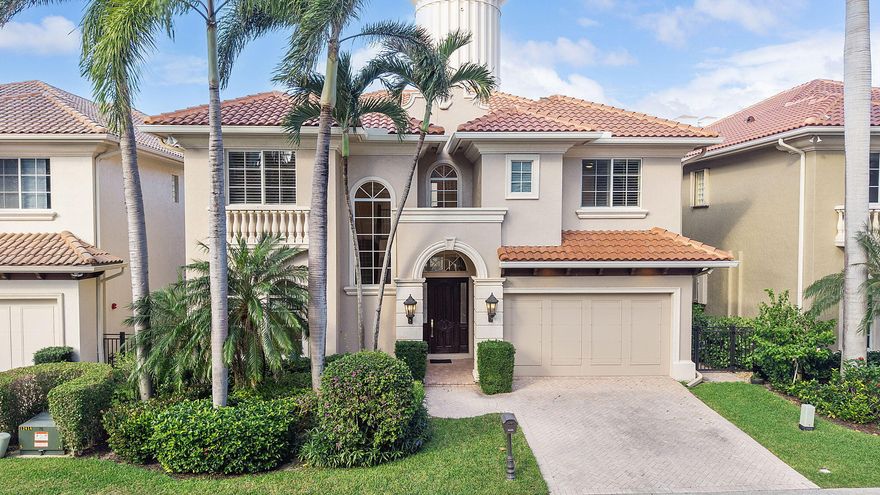 Welcome to one of Highland Beach's most exclusive and rarely available coastal enclaves -- a gated community of just 17 residences with private beach access only steps away.

Offered fully furnished and completely turn-key, this meticulously updated 4 bedroom/4 full bathroom home includes major 2025 capital improvements: a brand-new roof, new gutters, and full impact windows and doors -- providing both elevated style and long-term peace of mind.

Inside, soaring ceilings and abundant natural light frame a beautifully reimagined interior designed for effortless coastal luxury. A custom built-in bar with seating for eight anchors the main living space -- a striking focal point rarely found in comparable homes within the community. Plantation shutters, LED lighting throughout, integrated surround sound, custom closets, and refined finishes elevate the home's comfort and sophistication. Every detail has been thoughtfully curated to deliver a refined yet relaxed coastal lifestyle.