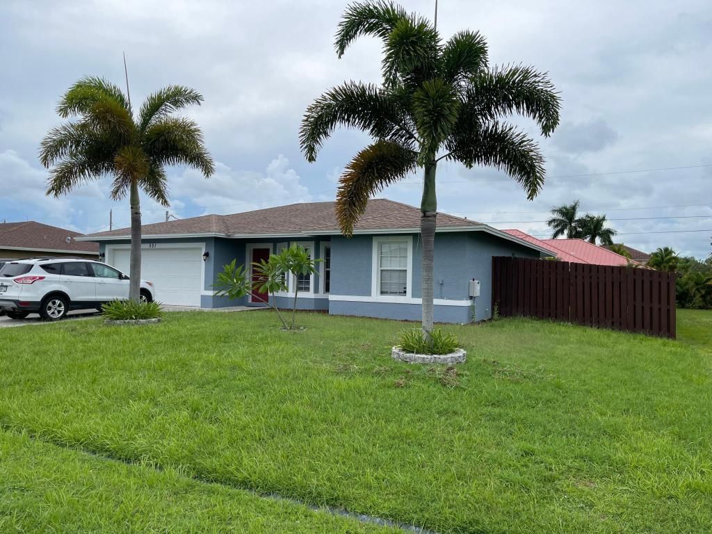 Photo of 551 SW Halifax Avenue, Port Saint Lucie, FL 34953 (MLS # R10951571)
