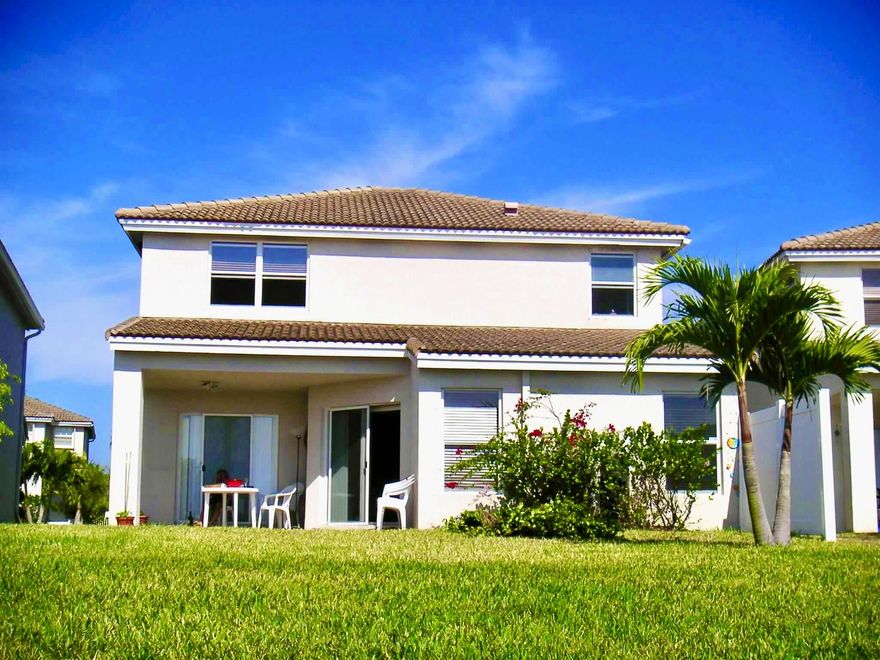 Live the dream in Briar Bay! This 4-bedroom, 2.5 bath lakefront home offers plenty of space and light. The community has a manned gate, 24 hr security and a great clubhouse with resort-style pool, spa, playground, splash pad, fitness room, and tennis courts. Perfectly located near schools, downtown West Palm Beach, highways, and restaurants. New floors in all four bedrooms, great kitchen with granite counter tops, primary suite with his and her closets, double vanity, tub and shower. This home combines comfort, convenience, and community in one beautiful package.