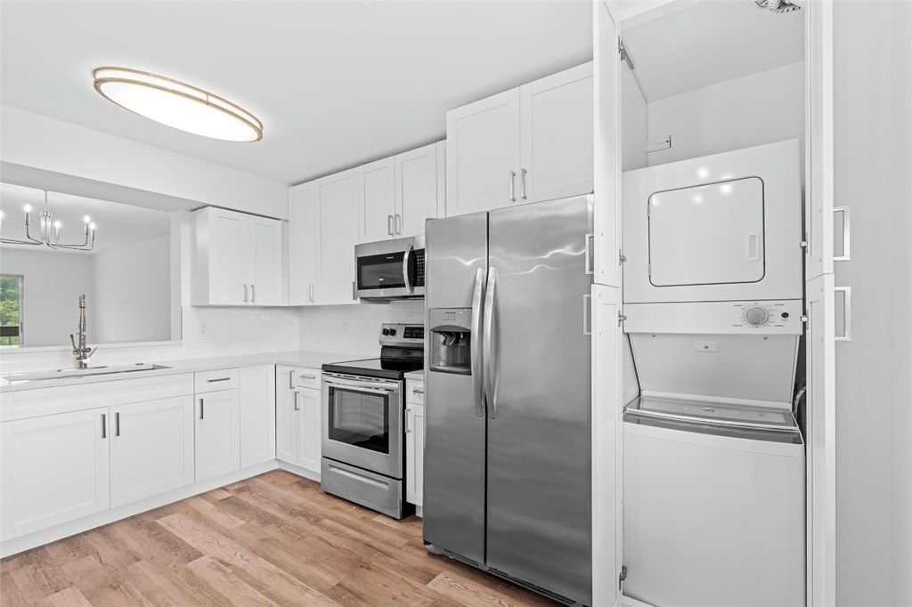 Photo of 7301 Amberly Lane #403, Delray Beach, FL 33446 (MLS # F10544597)