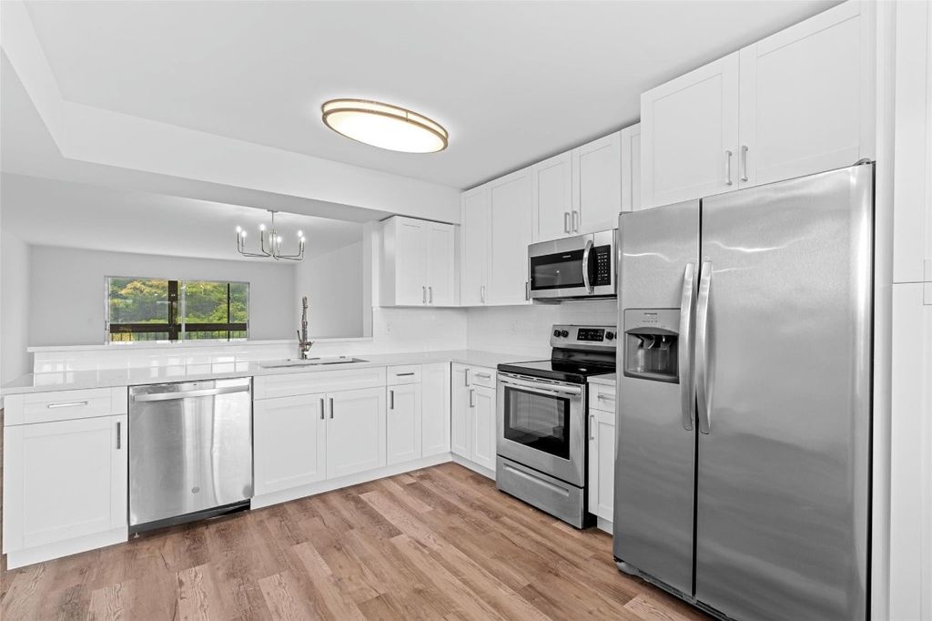 Photo of 7301 Amberly Lane #403, Delray Beach, FL 33446 (MLS # F10544597)