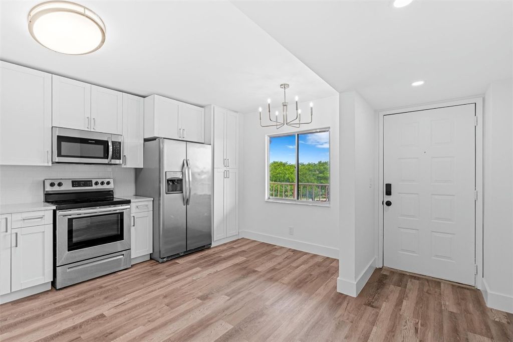 Photo of 7301 Amberly Lane #403, Delray Beach, FL 33446 (MLS # F10544597)