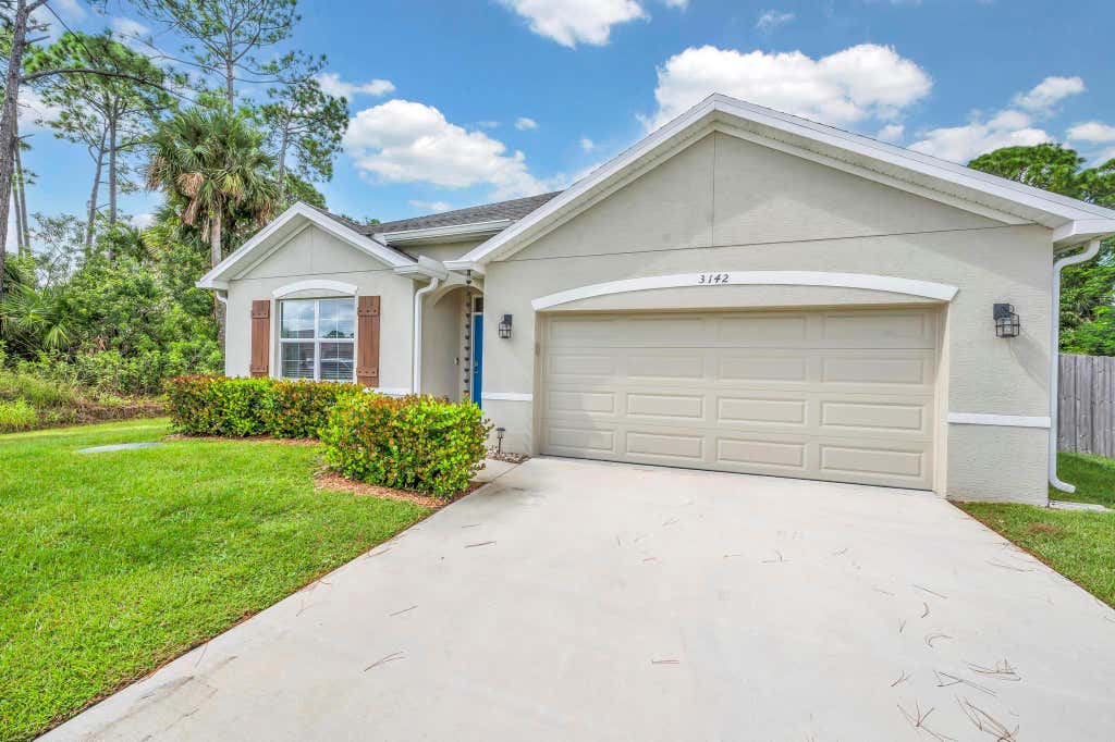 Photo of 3142 SW Armucher Street, Port St Lucie, FL 34953 (MLS # R10928231)