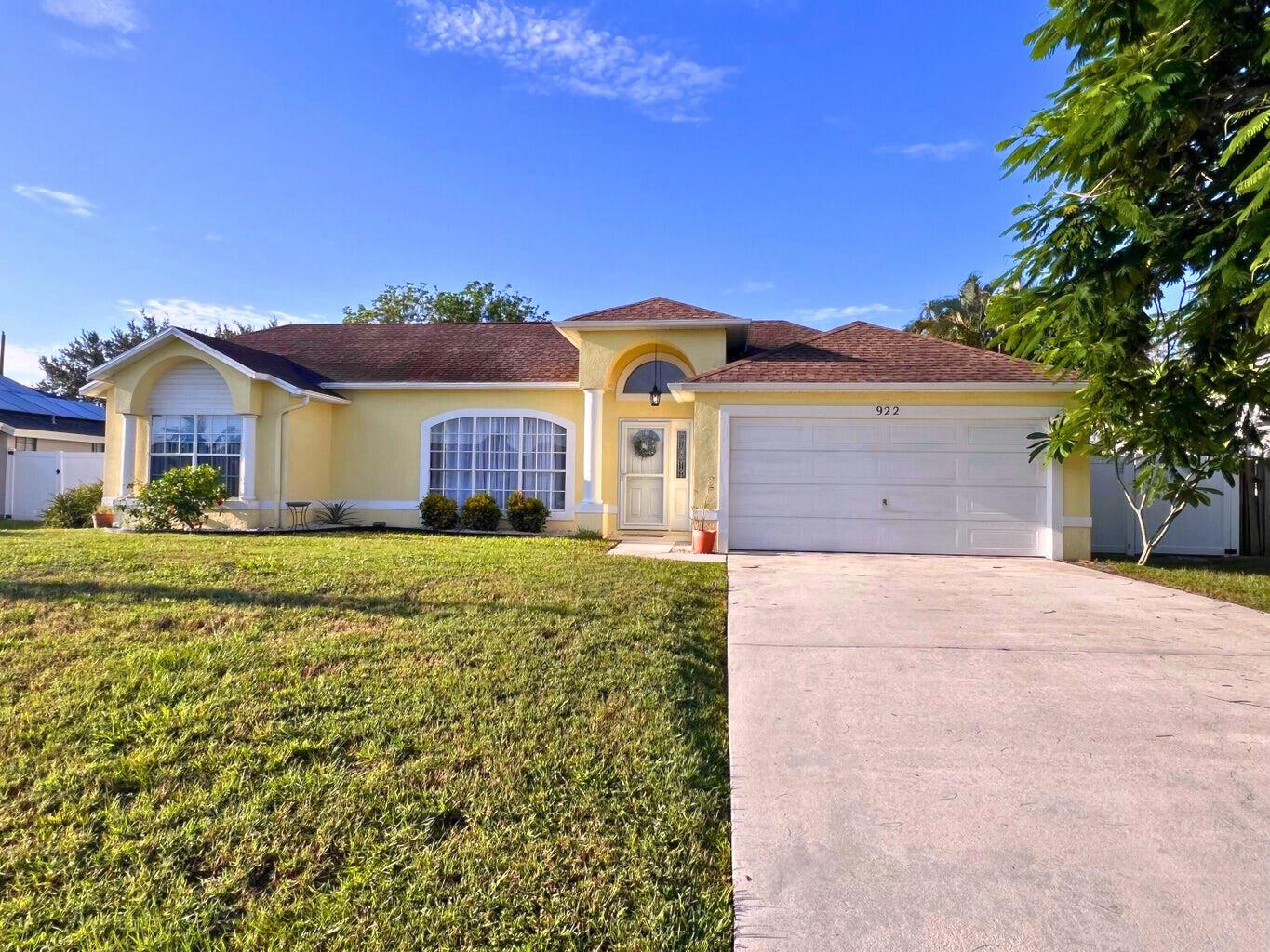 First time on the market! Well-maintained 3/2/2, MOVE-IN-READY home w/ LOW TAXES. No HOA! Quiet & conveniently close to EVERYTHING PSL offers! Updates include UNDERGROUND ELECTRIC by FPL, BRAND NEW HVAC (ask about warranty), Newer Water Heater (2023), Samsung Stainless appliances w/ new Refrigerator (Aug '25), Microwave (Nov '24), Washer (Nov '24), Fresh Interior Paint, and a 2011 roof for peace of mind. HIGH cathedral ceilings, SPLIT FLOOR PLAN offer 2 living areas--(one w/ potential for 4th bedroom). Central kitchen features 2 PANTRIES, peninsula bar & pass-through window. Large master suite w/ walk-in closet, garden tub & shower. Enjoy a lengthy screened porch under truss, wht VINYL fenced backyard w/ mature trees & existing well for possible future irrigation. MUST SEE TODAY!