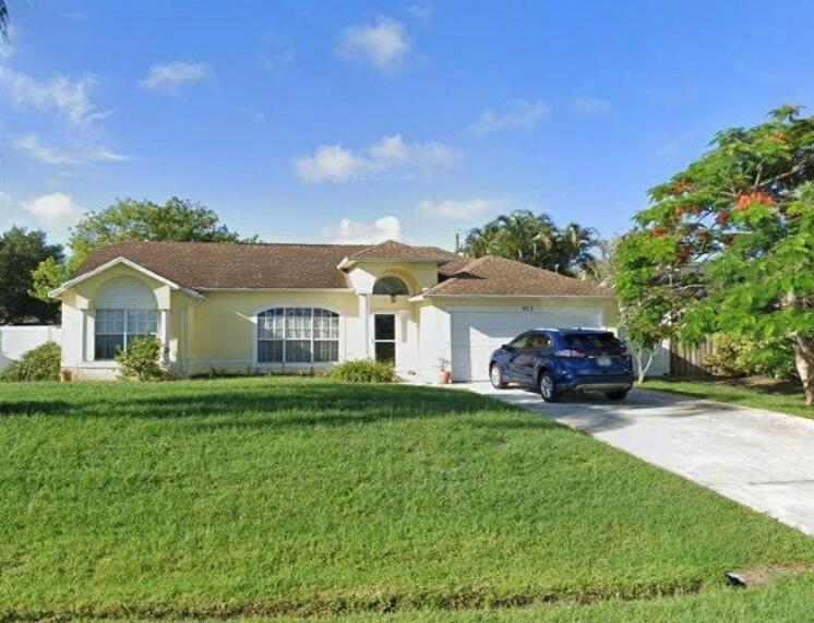 Welcome to this MOVE-IN ready, cherished one-owner home, nestled in a quaint neighborhood where neighbors wave, children play, & dogs are happily strolled. Just a block from the elementary school, nearby churches, and local shops w/ pizza, ice cream, and more. Inside, cathedral ceilings, a central open kitchen w/ 2 pantries, spacious split floor plan create a bright, open feel w/ 2 living areas (one with potential for a 4th bedroom). The roomy master suite features a walk-in closet, garden tub, & separate shower. Recent updates include underground electric by FPL, brand-new HVAC ('25), newer water heater ('23), Samsung stainless steel appliances with brand-new refrigerator & microwave, and a new washer. The 2011 roof adds peace of mind. Step outside to a lengthy tiled screen-in porch that