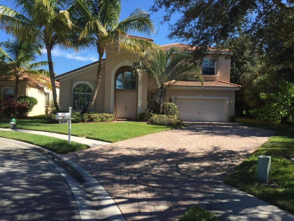 Photo of 2620 Sandy Cay, West Palm Beach, FL 33411 (MLS # R10705161)