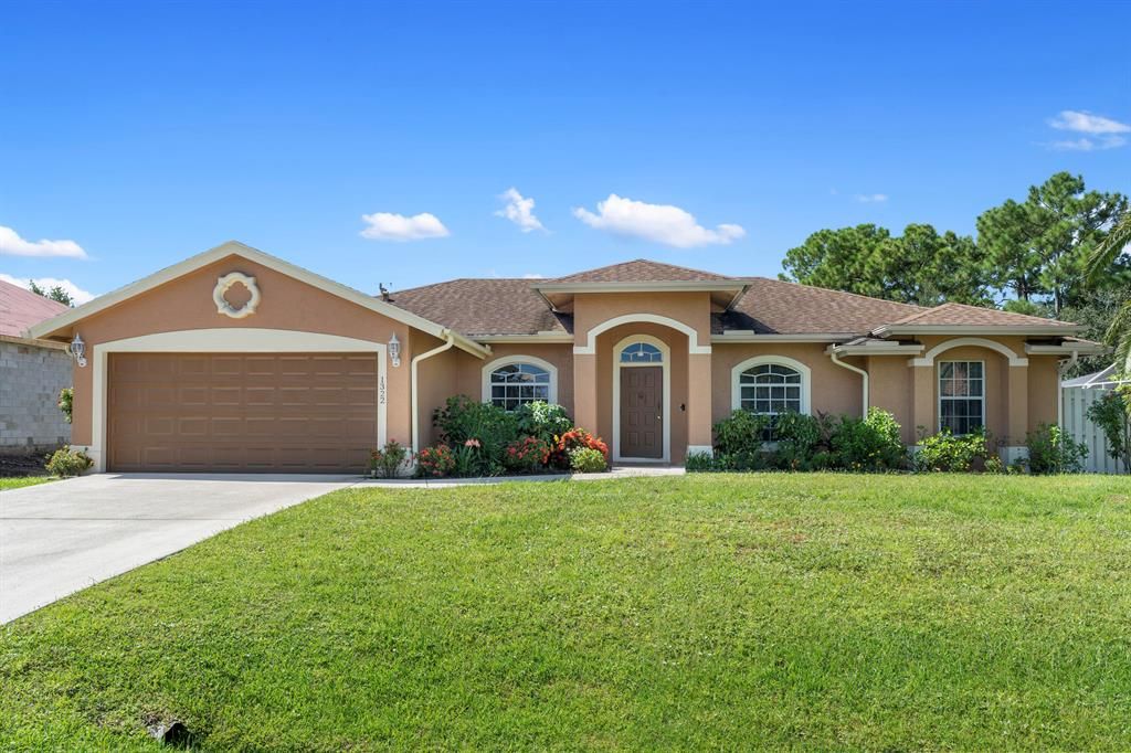 Photo of 1322 SW Leisure Lane SW, Port Saint Lucie, FL 34953 (MLS # R10746085)