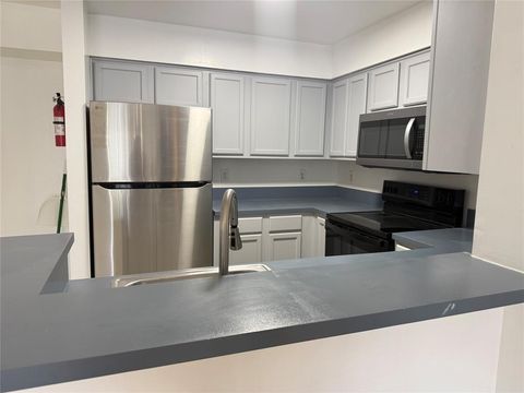 Photo of 7630 Westwood Dr #316, Tamarac, FL 33321 (MLS # F10536407)