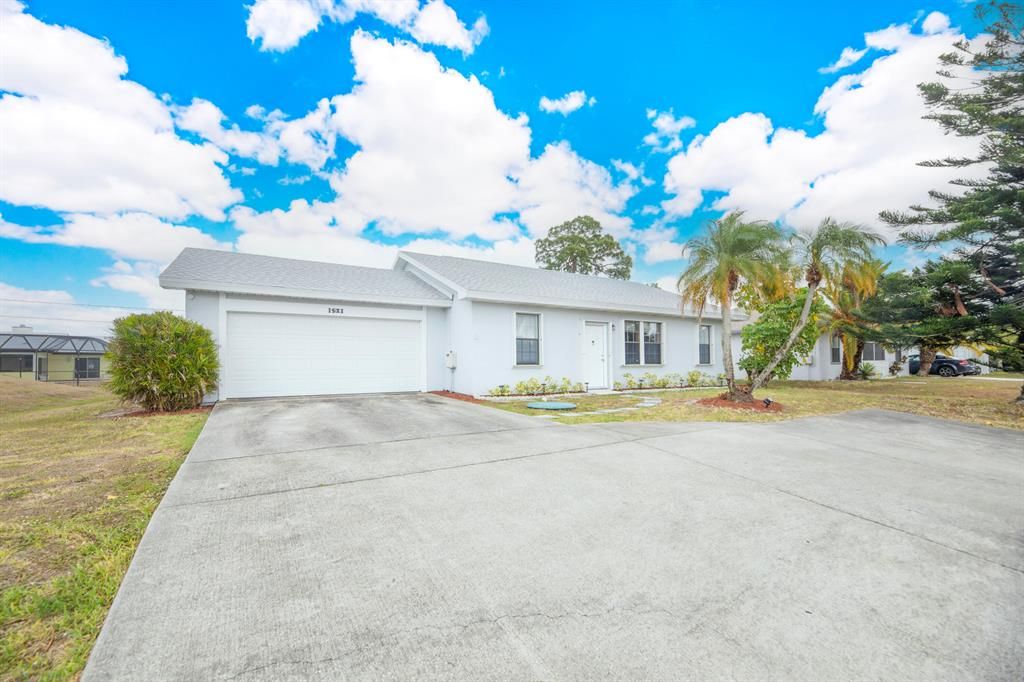 Photo of 1521 SE Airoso Boulevard, Port St Lucie, FL 34983 (MLS # R10881300)