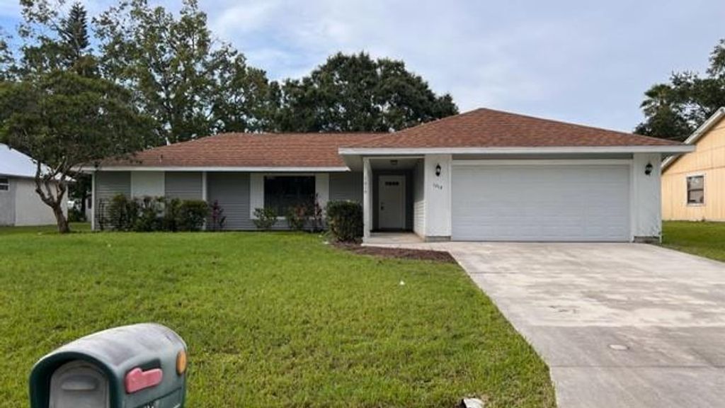Photo of 1019 SW Aurelia Avenue, Port St Lucie, FL 34953 (MLS # F10383731)