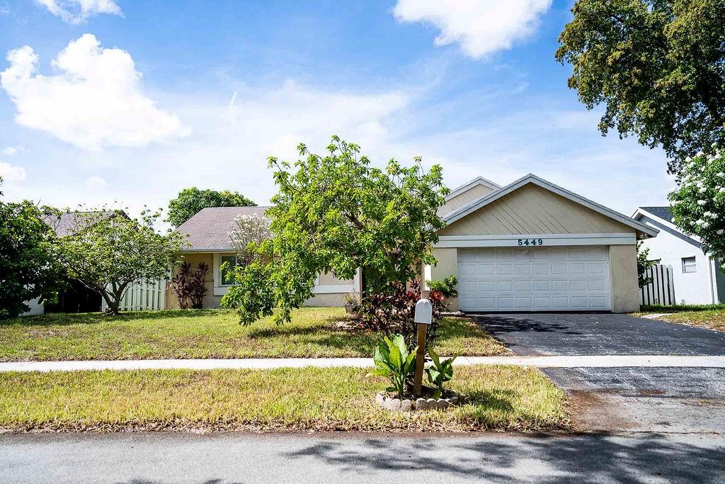 Add your finishing touches to create your dream home located in one of the most desired communities in Tamarac. Ideal for DIYers who can unlock full potential with updates to the kitchen, baseboards and deep cleaning. Vaulted ceilings with an abundance of the natural light coming in from the new hurricane impact windows and doors. Home features a large underground pool and family room has a stone fireplace. Perfect location for a growing family or generate great investment income with no rental restrictions. Conveniently located to great shops, dining & schools and close to Turnpike. This community features no homeowner's association. A/C (2023) , Water Heater (2023), Pool Pump (2023), Hurricane Impact Doors & Windows (2023). Priced to sell and easy to show.