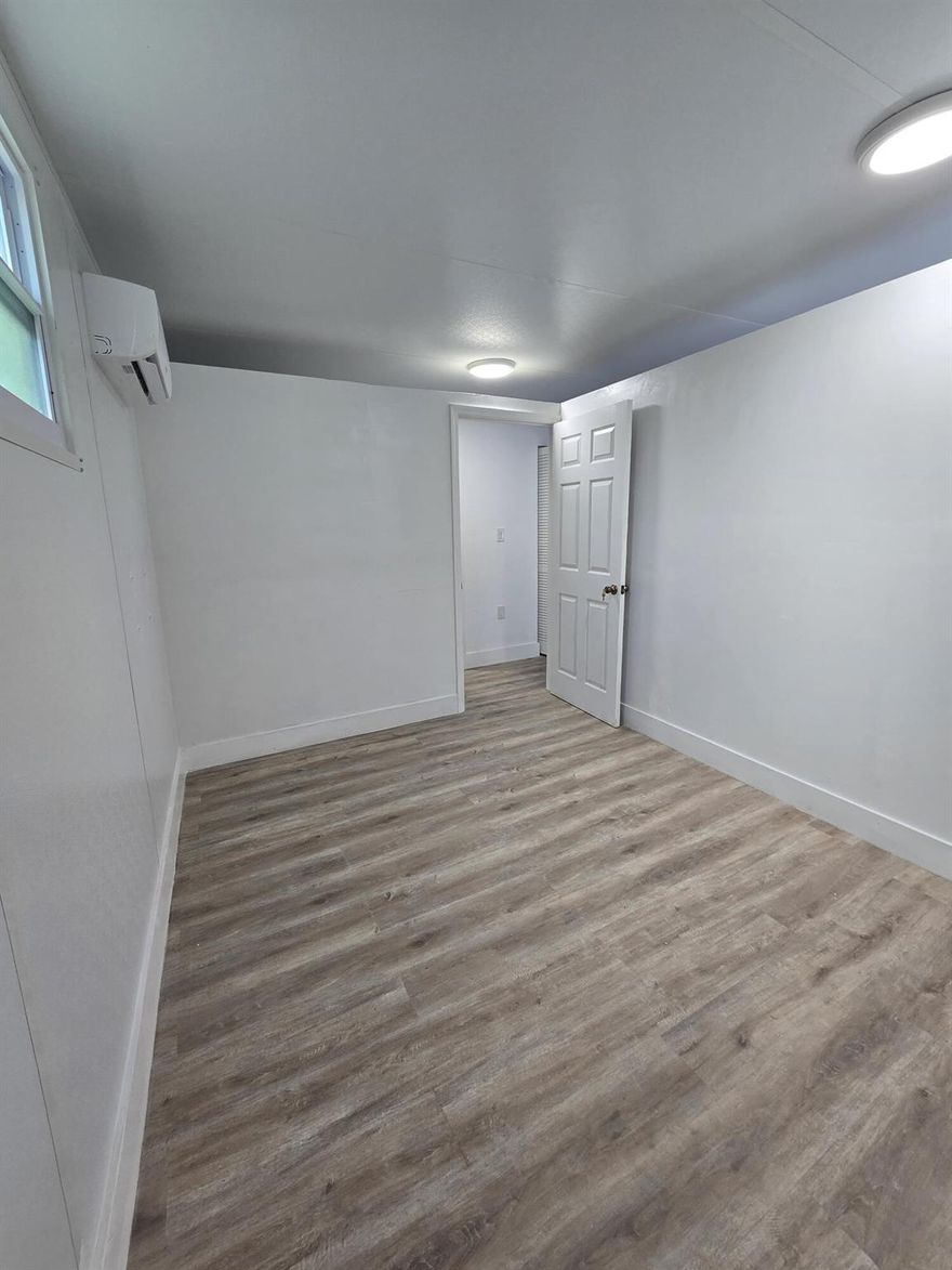 Remodeled Efficiency - All Utilities Included!Private entrance.Cozy, newly remodeled efficiency, perfect for 1-2 people. Includes water & electricity. Features a small kitchen, refrigerator, private bathroom, and open living space.Requirements: clean background, credit report, and proof of income. No smoking. $1,250 for one person, or $1,400 for two people.