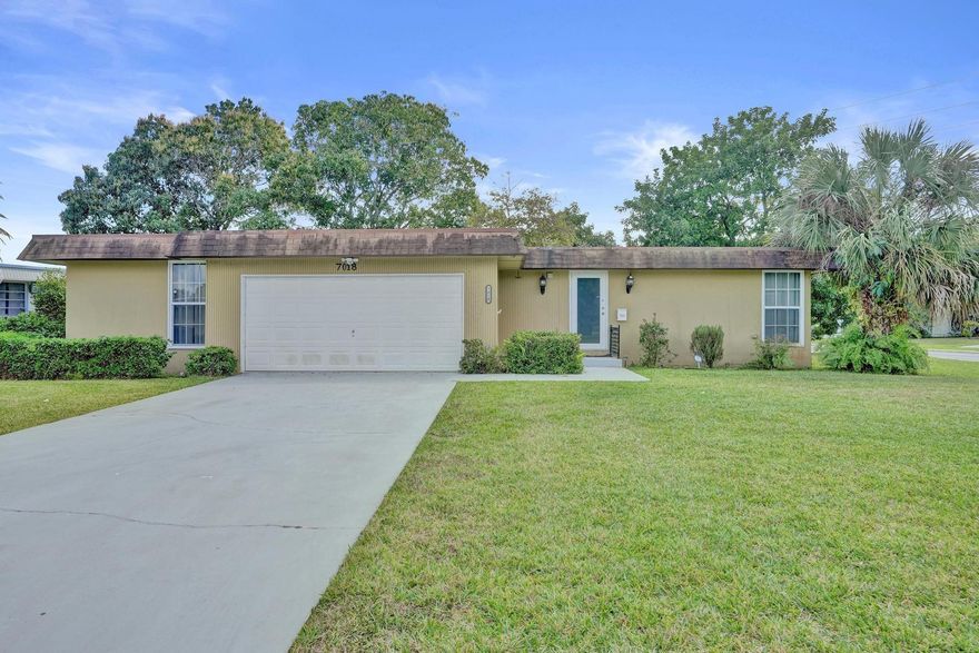 Tamarac Mainlands 2 Bedroom 2 Bathroom Corner Oversized Lot Water View Home. Roof 2018, Impact Windows, Updated Kitchen, Updated Bathrooms, New Tile Flooring, Updated Garage Door, Maintained Community, All Ages Community. Low HOA!