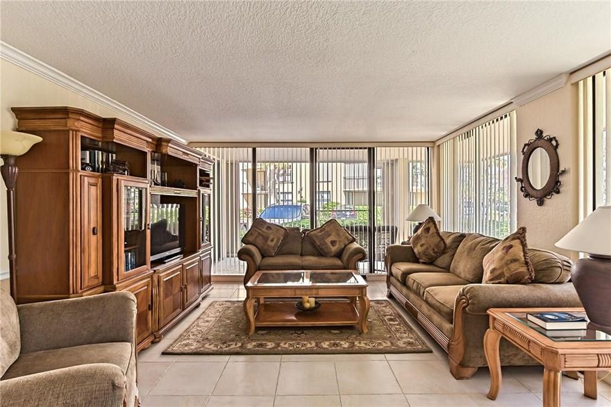 Palm Beach living at its finest. Bright & immaculate 2 bedroom 2 bathroom condo in the wonderful Harbour Club.  This first floor fully furnished garden level condo with plenty of natural light from sliders. All sliders have screens making unit airier, wrap around patio with accordion shutters is steps from the beach . Two assigned parking spaces & deeded beach access.Newer appliances, beautiful 18 "porcelain tile throughout, knockdown walls, professionally painted, crown molding and washer/dryer in unit