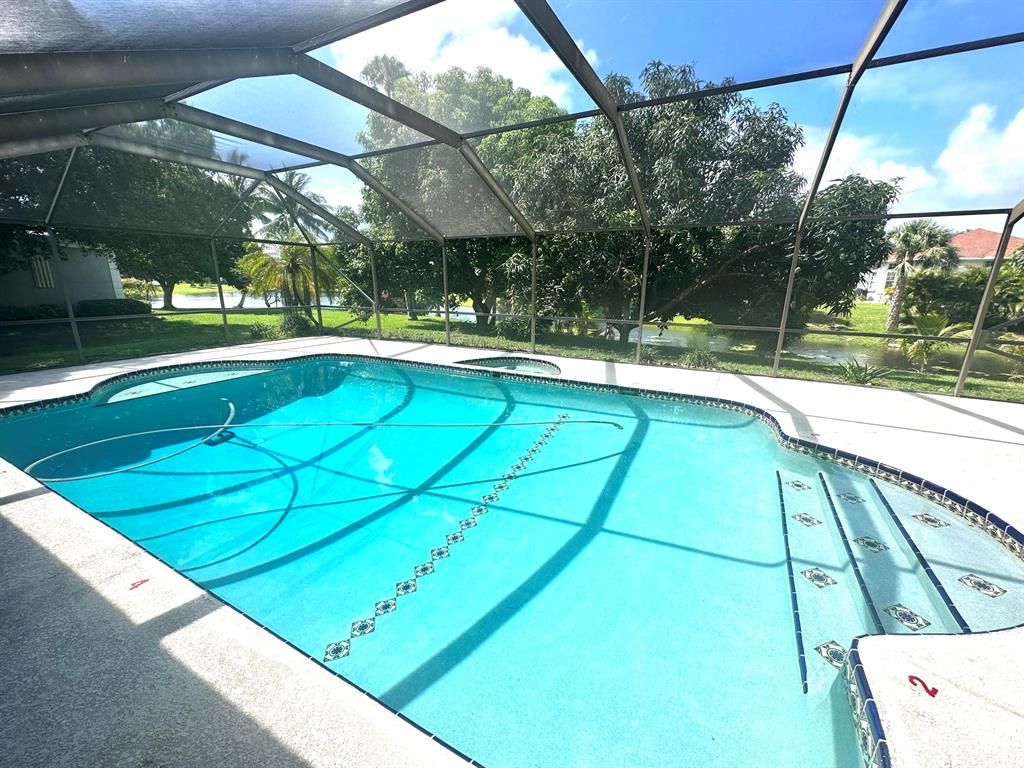 Photo of 2944 NE Loquat Lane, Jensen Beach, FL 34957 (MLS # R10890554)