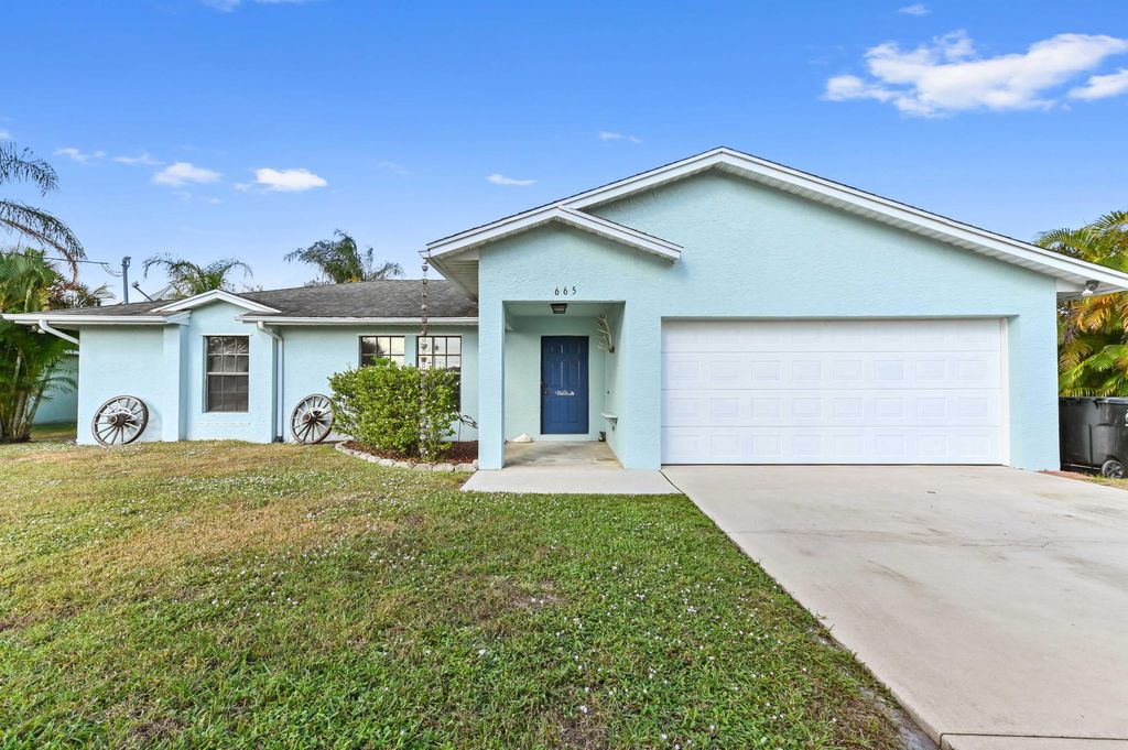 Photo of 665 SW Backert Avenue, Port Saint Lucie, FL 34953 (MLS # R11145319)