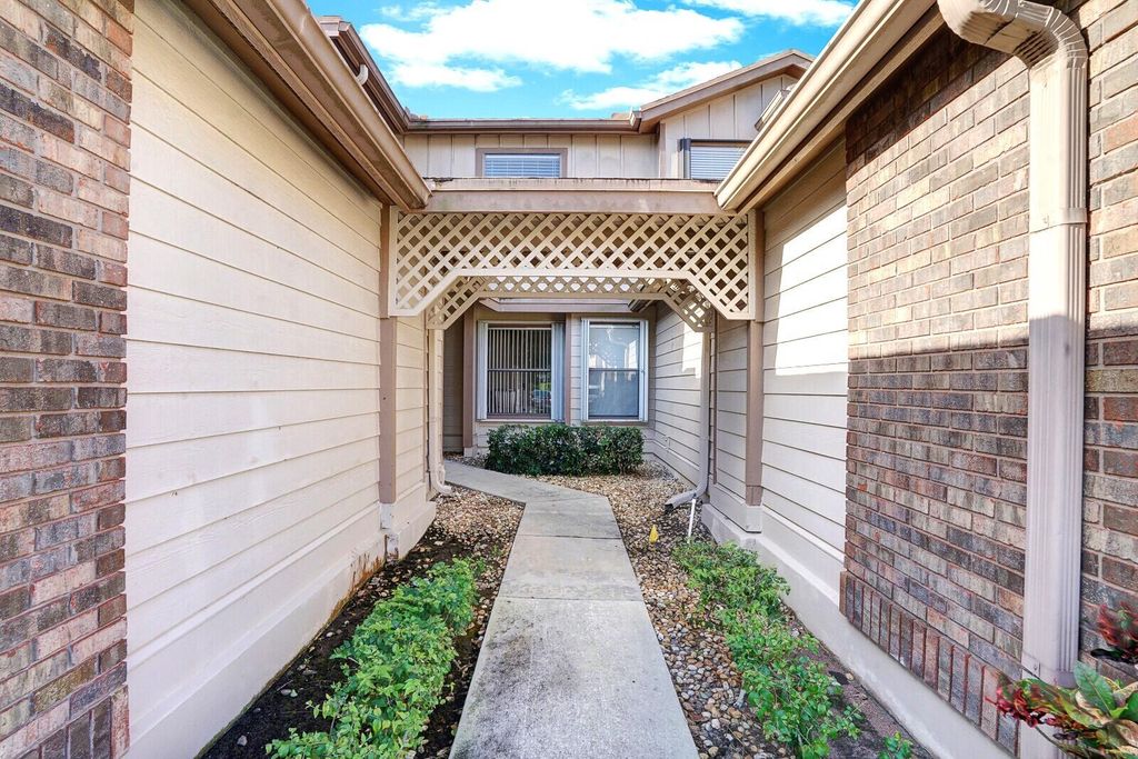 Photo of 300 Crosswinds Drive #E2, Greenacres, FL 33413 (MLS # R11079335)