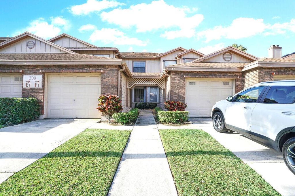 Photo of 300 Crosswinds Drive #E2, Greenacres, FL 33413 (MLS # R11079335)