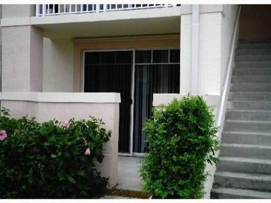 Photo of 4775 Chancellor Drive #11, Jupiter, FL 33458 (MLS # R10804656)