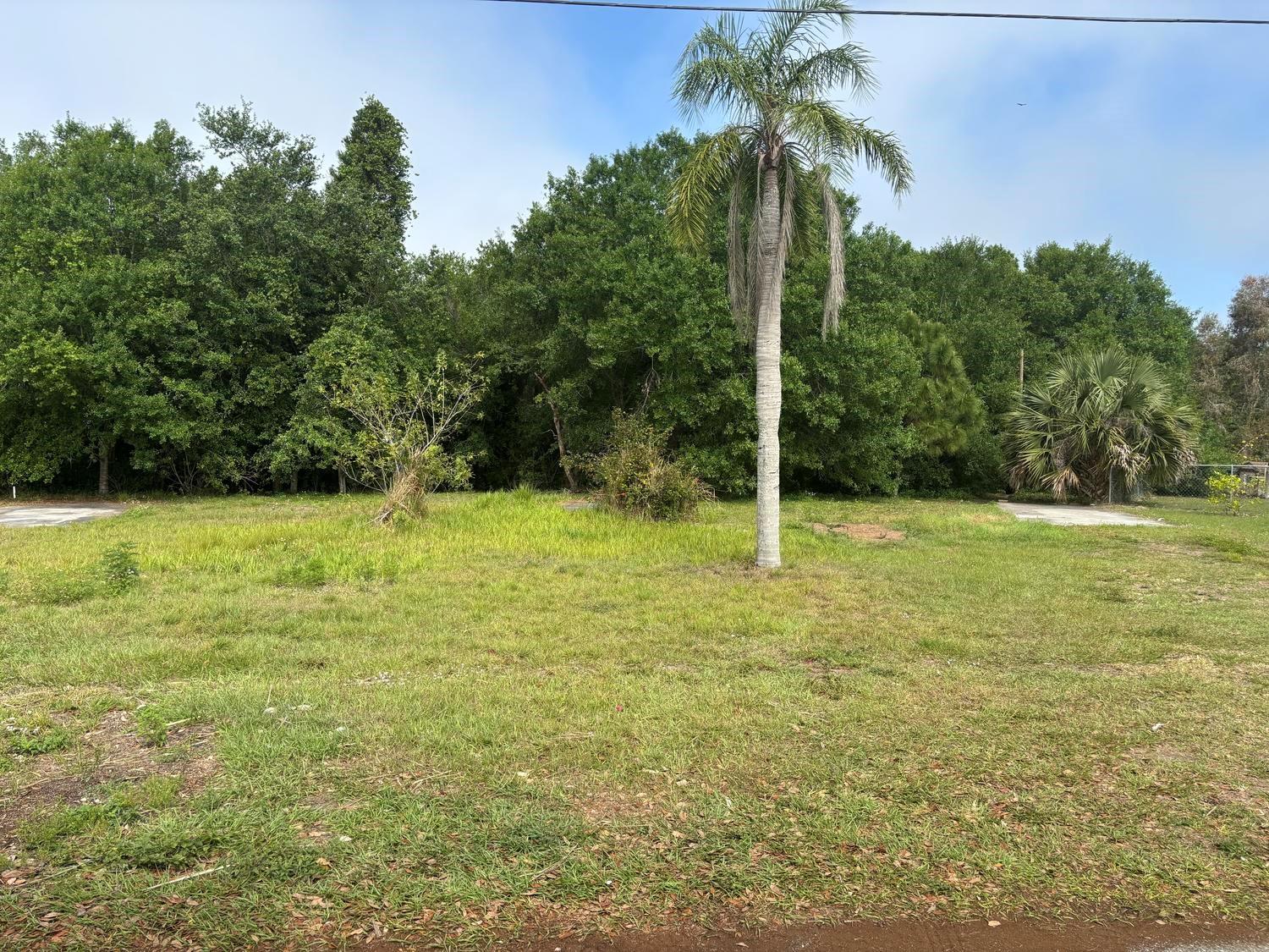 Oversized building lot on the East side of town with Canal, Culvert, Power Poles and  Selectively Cleared . Mobile Homes are permitted.
Owner finance with only $4,500 down