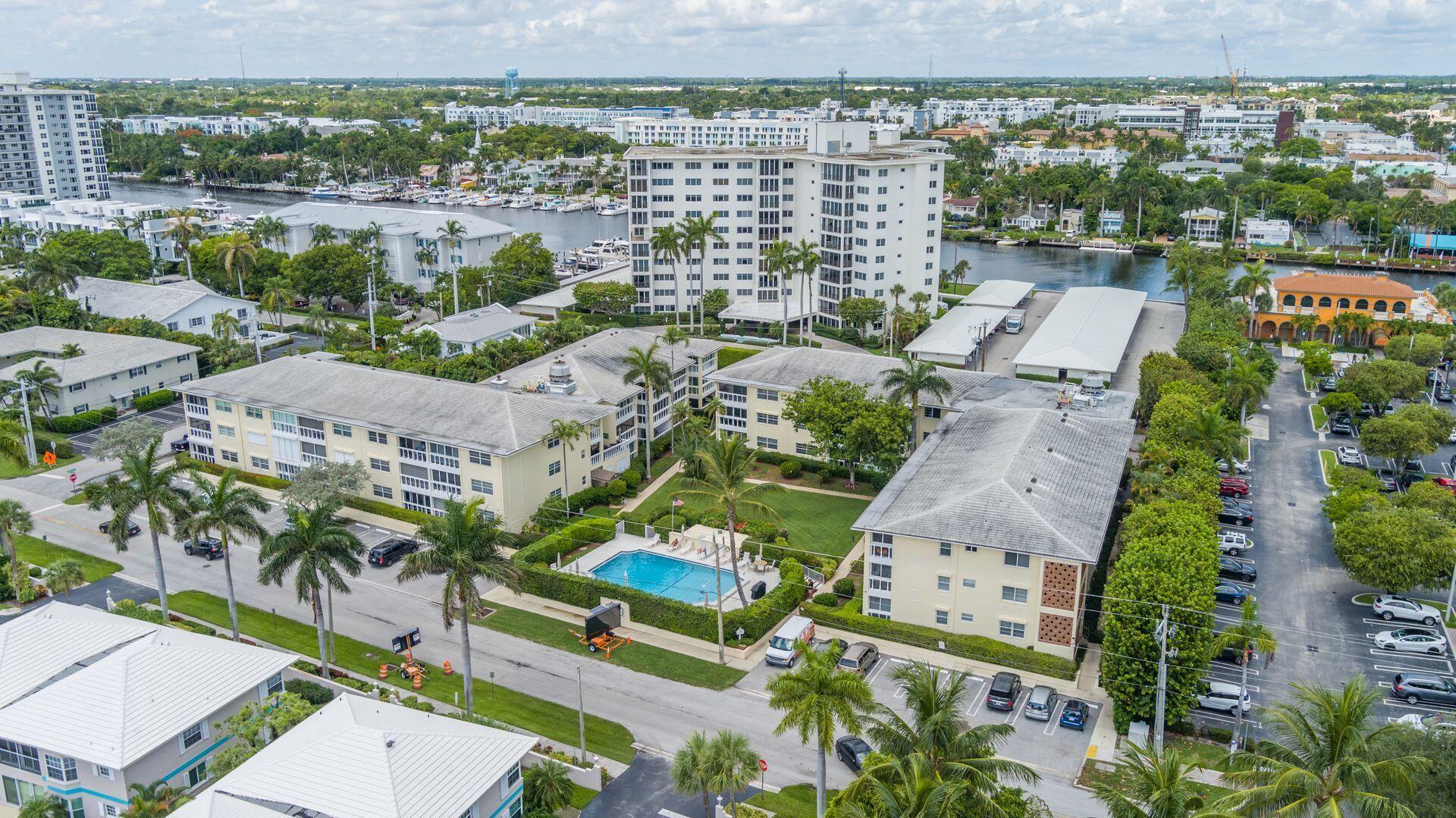 Location, location, location! Welcome to Miramar Gardens, this spacious 2 bedroom/ 2 bath condo is centrally located in vibrant Delray Beach. Just 1 block to popular Atlantic Avenue that is packed with amazing bistros, boutiques, cultural events, and festivals. Also, just a couple of blocks away is the Atlantic Ocean with beautiful beaches and world class fishing. Boasting a large sunroom off the primary bedroom, the S/E exposure allows you to enjoy natural sunlight in the morning. The main living area is extremely spacious and perfect for entertaining family and guests. The kitchen is equipped with Frigidaire appliances and has been recently upgraded. Another added feature is the den which, if desired, can be converted into a separate office space. The community pool is located within