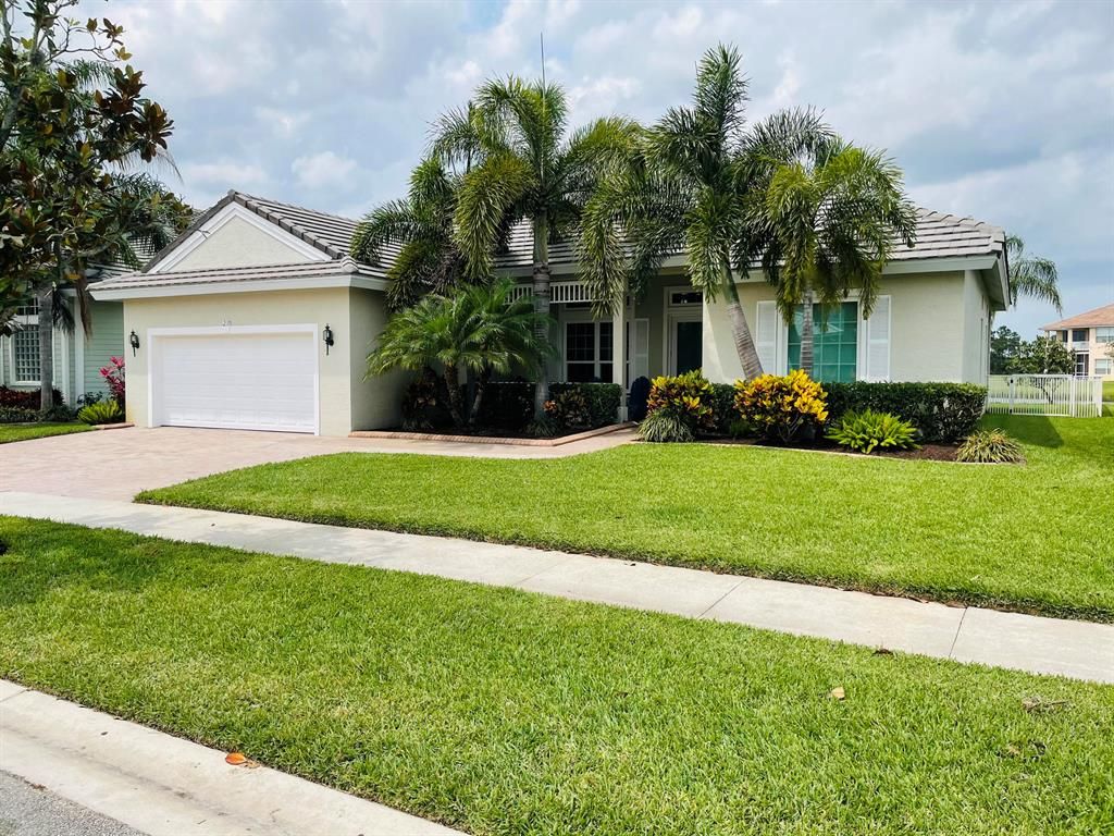 Photo of 217 NW Magnolia Lakes Boulevard Blvd, Port St Lucie, FL 34986 (MLS # R10711268)