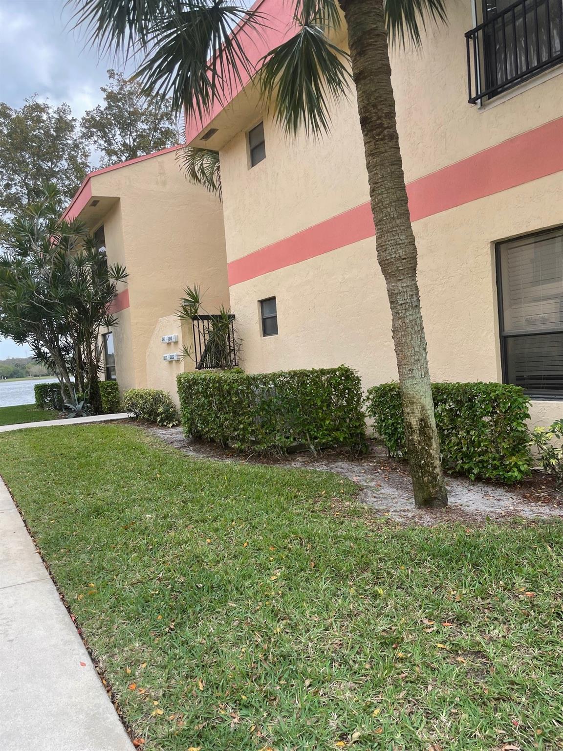 All ages-remodeled 1st floor. 2brdm/2ba condo in a 4 plex. Large tile throughout, screened patio w/washer & dryer, granite kitchen counters, dark wood cabinets, newer appl's, light fixtures, fans, closet doors. Also renovated bathrooms 2 yrs ago, with newer vanities and toliets. mstr bath has seemless shower door. Split bdrms, all amenities included, income must be 3 X's the rent, 700+ credit score required. Ready to rent with assoc approval. Turnpike is close by, & tradewinds park, no pets per assoc