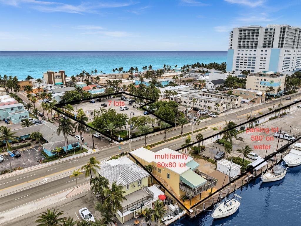 1.72 acres in most desireable beach community of Hollywood Beach! 42,085 sf on intracoastal with 600' of seawall/boat dock. Approx $1M annual income from leased parking lots/boat docks/3 rental multifamily income. Developers can continue income during permitting process or vacate the leases. Seawall is being raised in accordance with US Army C of Engineers waterways all area requirement. Environmental in process of being cleared from cleanup list.