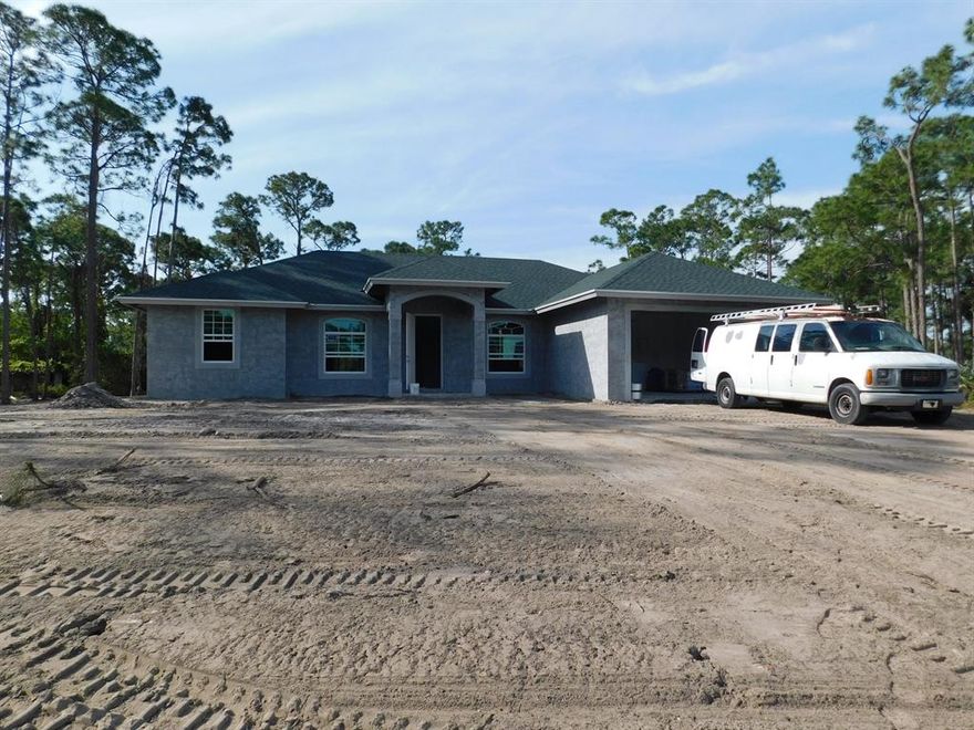 COME AND SEE THE QUALITY WORKMANSHIP ON THIS GRAND NEW CONTEMPORARY HOME. THIS CHARMING 3 BEDROOM OFFERS ALL IMPACT WINDOWS. THE COVERED ENTRY LEADS YOU INSIDE TO THE FOYER AREA TO AN OPEN AND AIRY FLOOR PLAN. THE KITCHEN OFFERS STAINLESS STEEL APPLIANCES, GRANITE COUNTERS AND AN UNDER MOUNT SINK WITH A PULL OUT FAUCET. ENJOY YOUR MEALS IN THE COZY NOOK AREA OR YOUR FORMAL DINING ROOM. THE MASTER OFFERS A WALK IN CLOSET AND HAS AN EN-SUITE BATH WITH GRANITE COUNTERS, DOUBLE SINKS AND A ROMAN TUB. SLIDERS LEAD OUTSIDE TO THE COVERED PORCH. OTHER SPECIAL FEATURES INCLUDE ARCHED DOORWAYS, SECURITY SYSTEM, CEILING FANS WITH LIGHT FIXTURES. NO HOA. HORSES AND PETS ARE WELCOME.