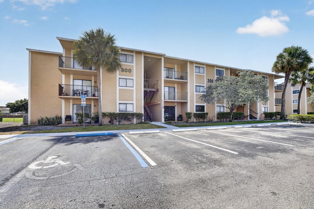 Photo of 300 Palm Circle W #106, Pembroke Pines, FL 33025 (MLS # B26047390)
