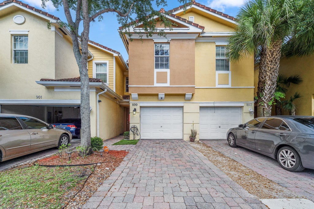 Photo of 899 Pipers Cay Drive, West Palm Beach, FL 33415 (MLS # R11094197)