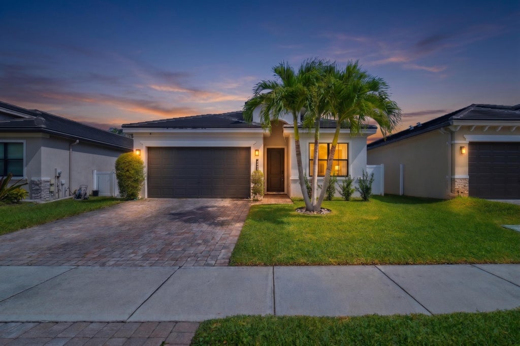 Photo of 7461 Moonrise Drive, Lake Worth, FL 33467 (MLS # B26091637)