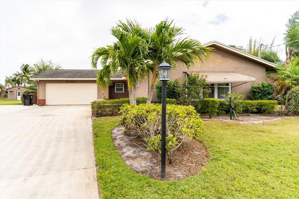Photo of 2455 SE Bordeaux Court, Port St Lucie, FL 34952 (MLS # R10880944)
