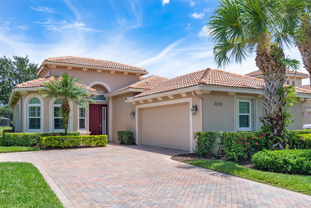 Popular Mid-Ocean features an ACTUAL 3 FULL BEDROOMS, 2 Bath floorplan with long LAKE VIEWS. You will Love this light, bright kitchen boasting white cabinetry, granite countertops, subway tile backsplash, LG SS appliances, under cabinet lighting, and a breakfast nook with lake views. Relax in the Master Bath, offering newer, upgraded cabinets, dual sinks, quartz countertops, framed mirrors, and modern light fixtures. Other upgrades include a Murphy Built-in bed, all tile flooring, whole house water filtration system, speaker system, Elfa closet shelving in all bedrooms, crown molding, plantation shutters, NEWER A/C & HOT WATER. NO WORRIES... with ALL IMPACT WINDOWS and accordion hurricane shutters. Enjoy the Florida lifestyle on your extended brick paver lanai with hot tub & lake views.