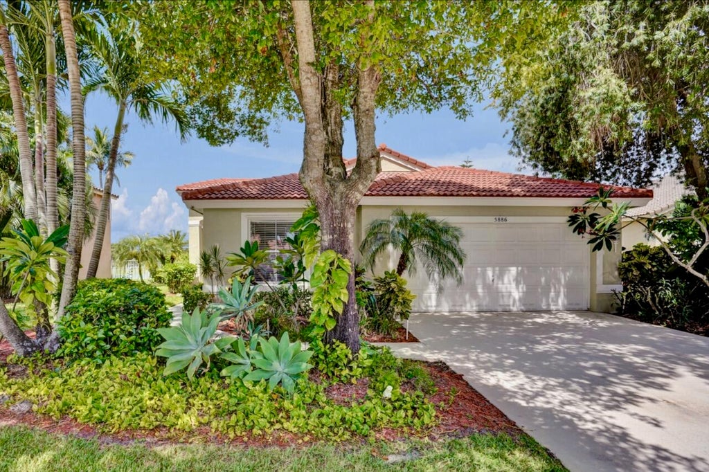 Photo of 5886 Las Colinas Circle, Lake Worth, FL 33463 (MLS # B26058796)