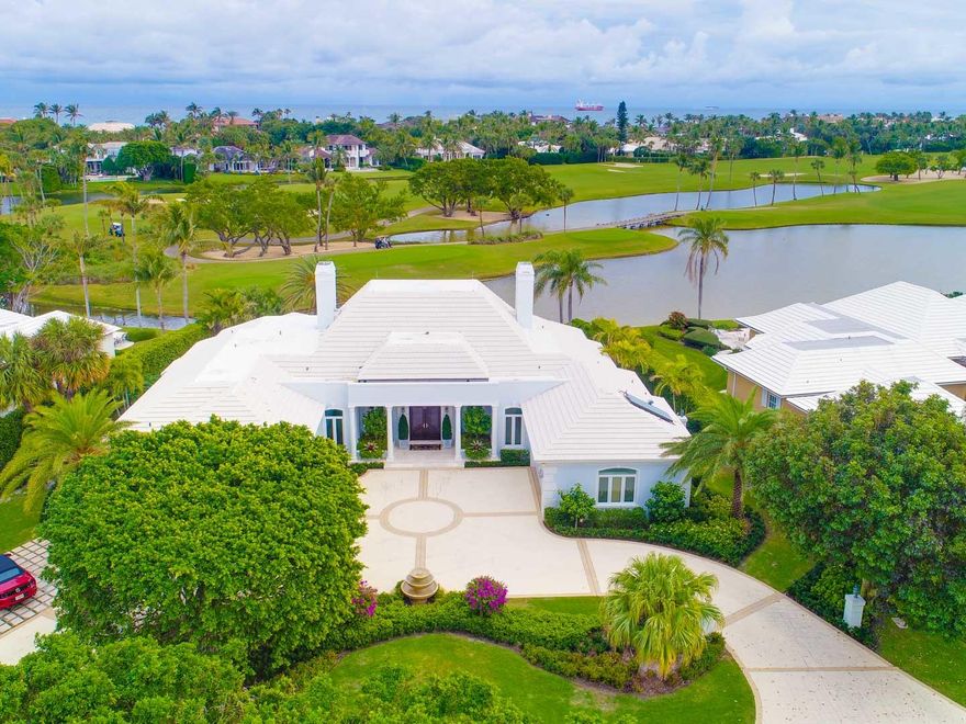 Enjoy sunrises overlooking golf course lakes and double fairways from this completely renovated residence. This open floorplan includes four bedrooms, a study, and five baths and two half baths. Gracious living spaces with beautiful finish work. One of Lost Tree's most sweeping golf course views available.