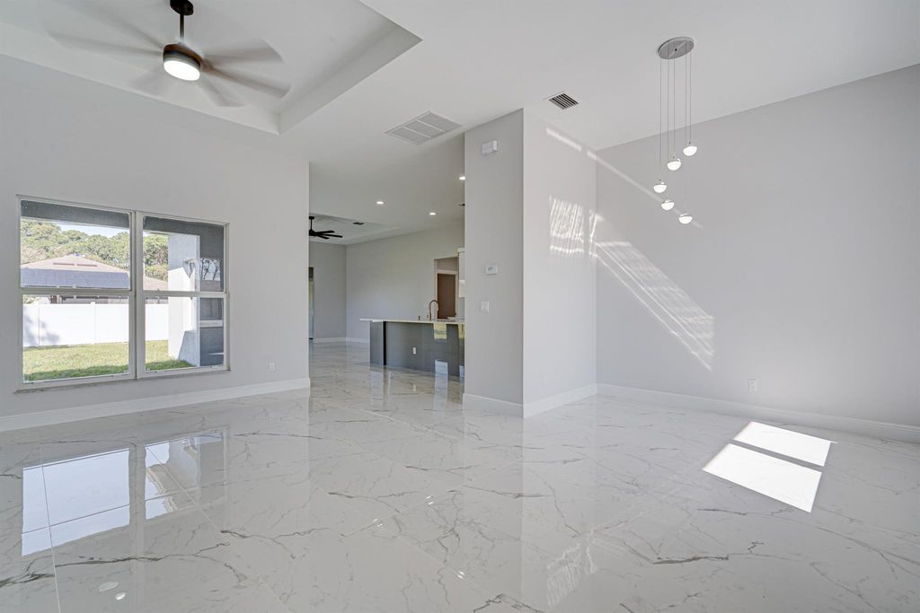 Photo of 1253 SW Abisco Road, Port Saint Lucie, FL 34953 (MLS # R10930286)