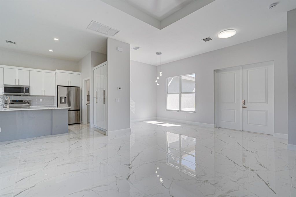 Photo of 1253 SW Abisco Road, Port Saint Lucie, FL 34953 (MLS # R10930286)