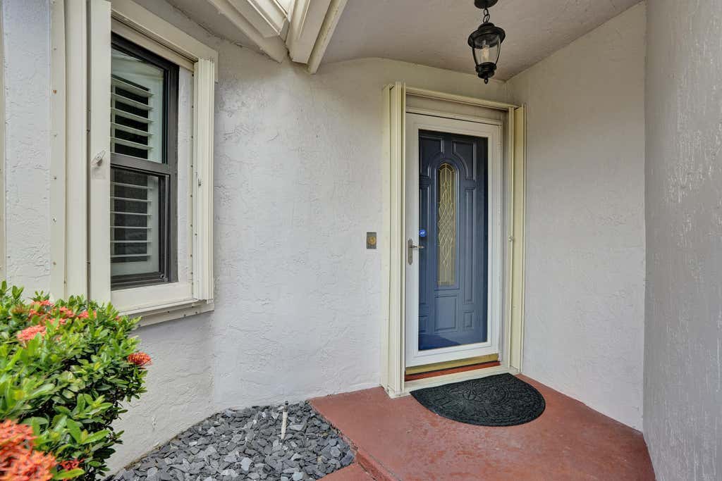 Photo of 635 DEER CREEK NORTH SHORE Drive, Deerfield Beach, FL 33442 (MLS # B26057471)