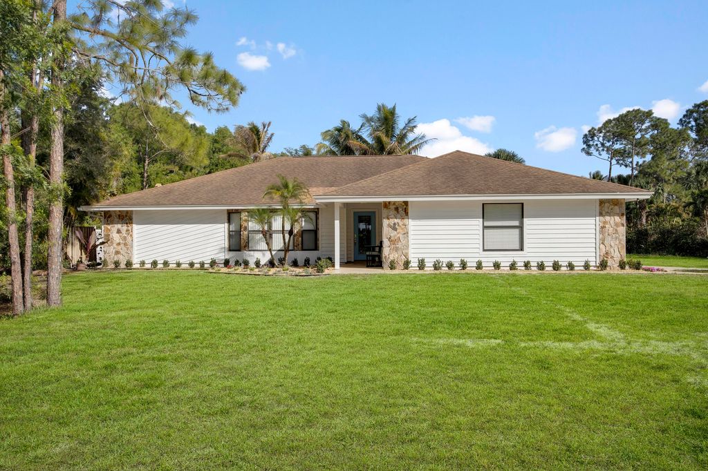 Photo of 17738 122nd Drive N, Jupiter, FL 33478 (MLS # R10851236)