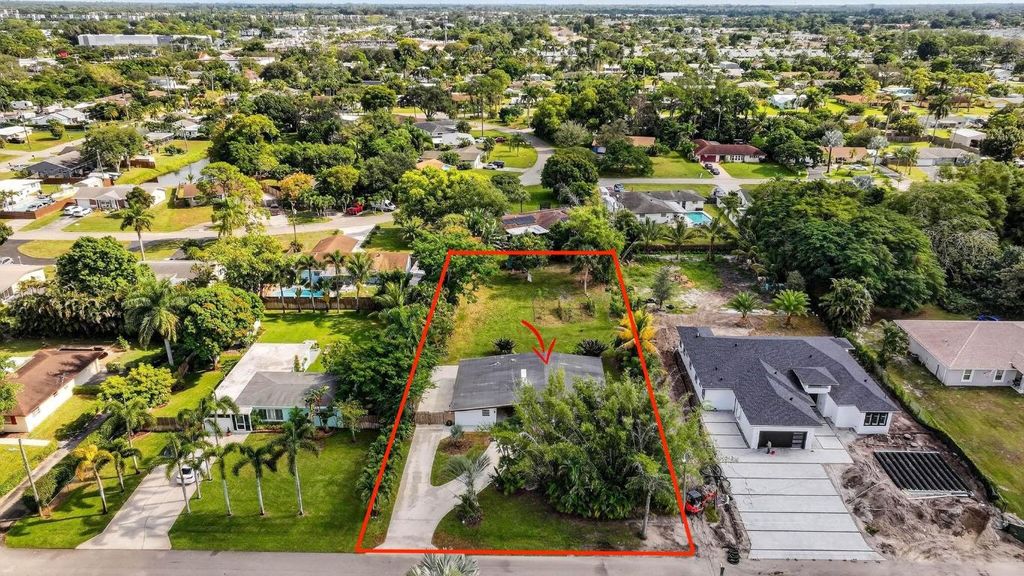 Photo of 51 Barberton Road, Lake Worth, FL 33467 (MLS # R11143940)