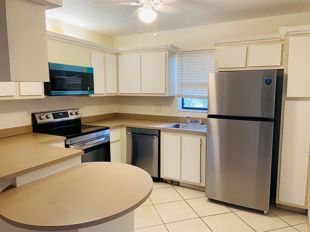 Photo of 7506 Courtyard Run E #7506, Boca Raton, FL 33433 (MLS # R11105204)