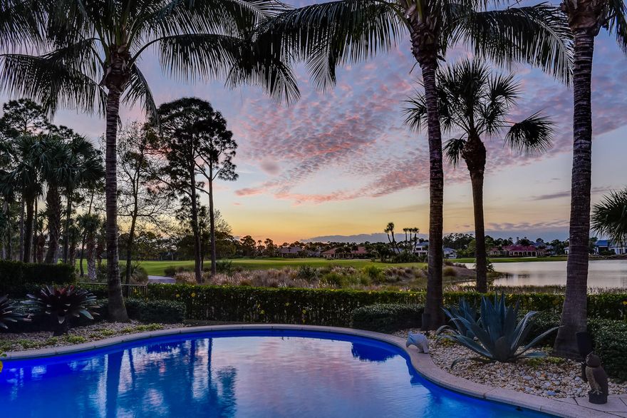 Palm Beach elegance meets private club living in this pristine former model home in Old Palm Golf Club. Enjoy long lake views and stunning sunsets overlooking the Championship Golf Course from the covered lanai with fireplace, summer kitchen, and motorized Phantom Screens. Perfectly designed for casual family living or the highest level of entertaining, this impeccable home offers 4 bedrooms, 5.1 baths, and a 3-car garage. Exceptional details throughout this timeless design include marble floors, elegant mouldings, custom built-ins, Thermador appliances, cove lighting, heated pool/spa, and impact glass throughout. Just 4 years new, this home has been recently updated with additional architectural details, landscaping, and designer furnishings.