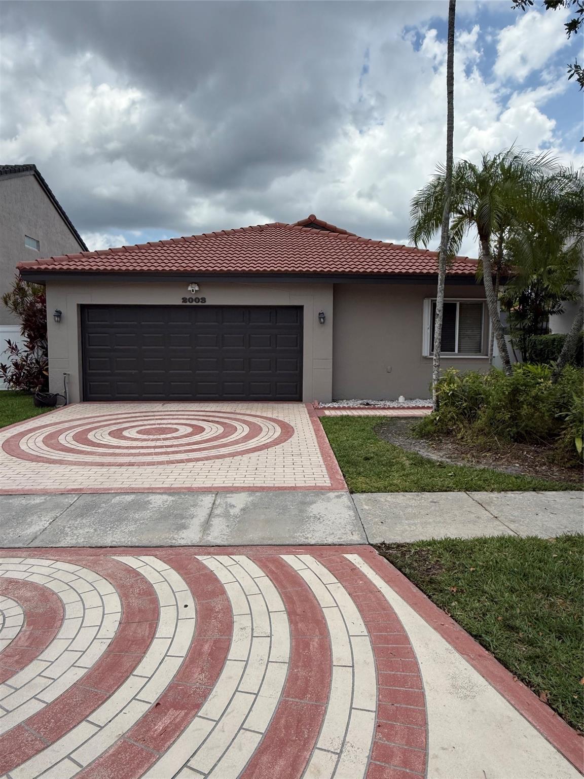 Charming home, with all the trimmings waits for working professionals at this gated community! This home has it all from Granite Kitchen, Stainless Steel Appliances, with updated bathrooms, Lamps and TV Fixtures surrounded with beautiful Porcelain Floors in this more than spacious home. Back yard is Fenced for privacy, with patio flooring; simply bring your outdoor furniture and BBQ! Water/Garbage/Lawn/Basic Cable/Internet/Pest Control Service included, so simply relax in this private Stellar Home! Home is close to all major highways from 75/Turnpike/595 and so much more. Shopping is a few minutes' drive along with fine dining! The location is stellar and surely the place to be! Can be viewed easily, text agent directly for appt's. Pls read Broker remarks.