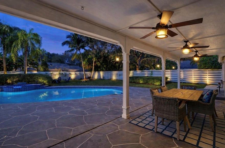 $15,000 Seller Credit. Two Homes under one roof in Countywalk, this spacious 6-bedroom, 3-bathroom home offers comfort and exceptional outdoor living. The property includes a separate-entrance 1-bed 1-bath in-law quarters with its own washer/dryer and kitchenette—perfect for family or $2000/month Rental Income. Impressive 14,600-sq-ft lot, the backyard is a private retreat featuring a 45×20 pool/spa, large covered patio ideal for entertaining, and a storage shed for added convenience.Inside, features a remodeled kitchen with an island breakfast bar, remodeled bathrooms, recessed lighting, and Spanish tile throughout. Major upgrades include full hurricane protection, A/C installed 2019, and two tankless water heaters. The 2-car garage with epoxy floor, large driveway for additional parking.