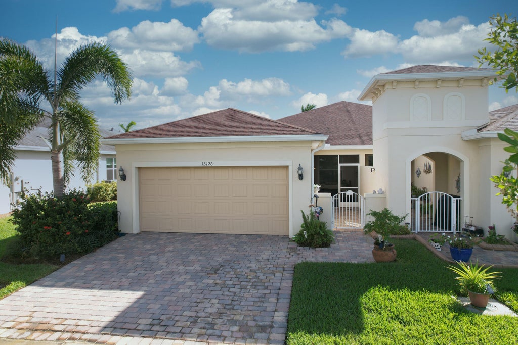 Photo of 13126 SW Aureolian Lane, Port Saint Lucie, FL 34987 (MLS # B26046371)