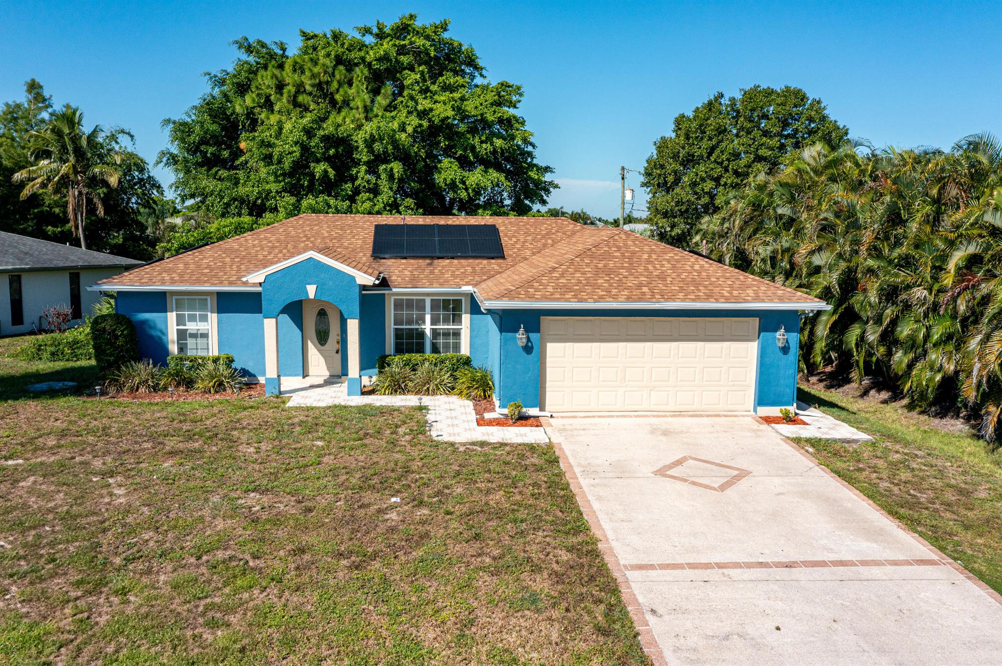 Updated CBS home with solar panels (paid off at closing). Two year old roof, updated kitchen with 42'' cabinets, glass front cabinet doors, Quartz counter tops, tray ceilings, private irrigation well, roman soaking/spa tub in the guest bathroom, double vanity in the main bathroom, stand up shower with a seamless shower enclosure in the main bathroom, ceiling fans and so much more! Conveniently located near parks, schools, shopping, and dining, with easy access to major roads. Move-in ready and waiting for you!